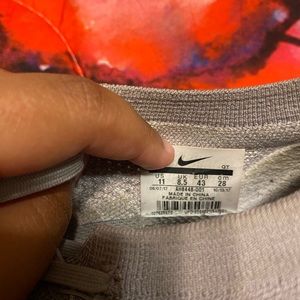 grey vapormaxes with pink details